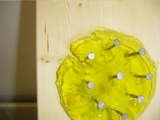 Jelly with nine nails in it, falling to bits