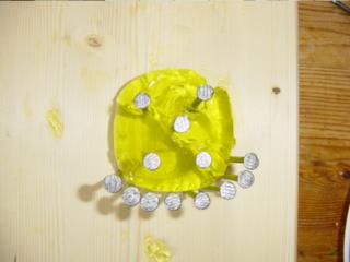 Small piece of jelly nailed to the wall